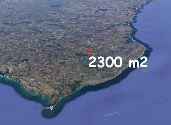 Продается участок под застройку площадью 2300 кв.м., вода и электричество на границе, 7 км до моря.
