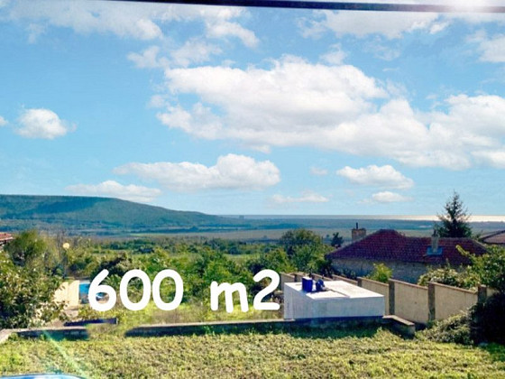 Земельный участок под застройку площадью 600 кв.м, водоснабжение и электричество на границе, разрешение на строительство, востребованный поселок, 4 км до моря.