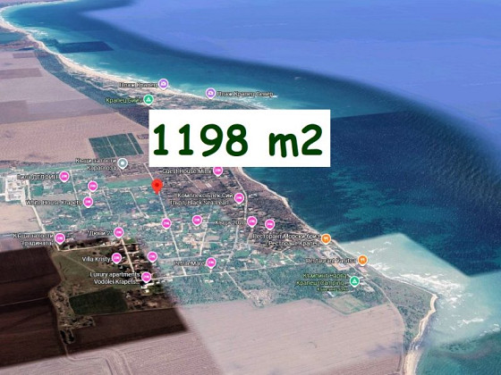 Terrain constructible de 1200 m² avec eau et électricité, de préférence dans un village, à 500 m de la mer.